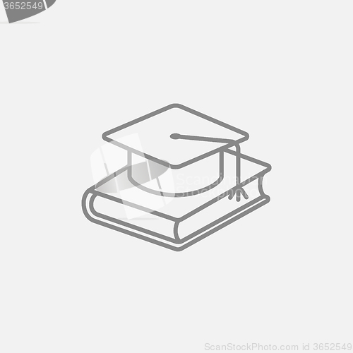 Image of Graduation cap laying on book line icon.