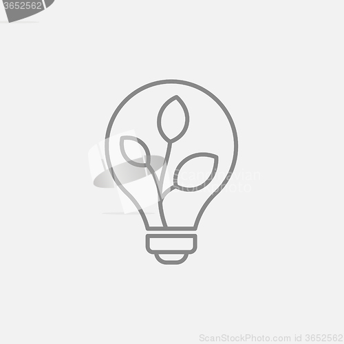 Image of Lightbulb and plant inside line icon.