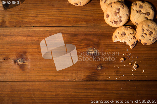 Image of close up of oat cookies on wooden table