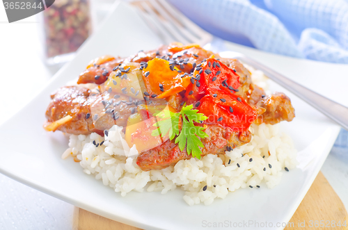 Image of boiled rice with meat and vegetables
