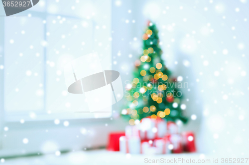 Image of room with christmas tree and presents background