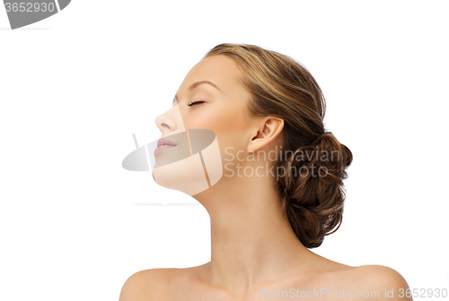 Image of young woman face and shoulders