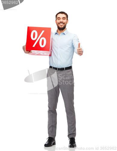 Image of smiling man with red shopping bag