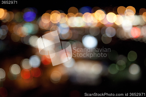 Image of colorful bright lights on dark night background