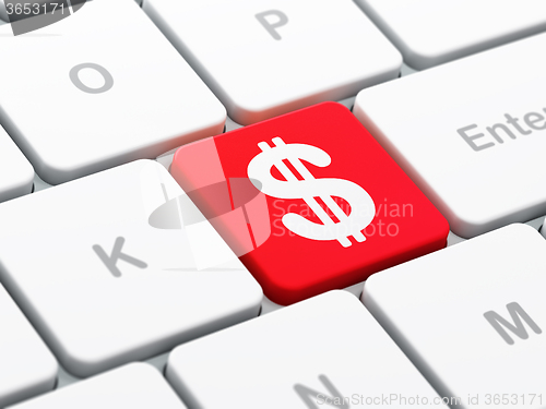Image of Currency concept: Dollar on computer keyboard background