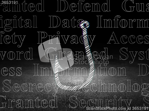 Image of Protection concept: Fishing Hook in grunge dark room
