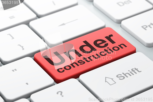 Image of Web development concept: Under Construction on computer keyboard background