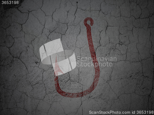 Image of Protection concept: Fishing Hook on grunge wall background