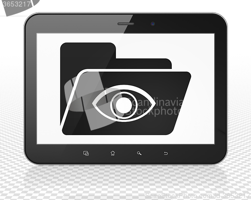 Image of Finance concept: Tablet Pc Computer with Folder With Eye on display