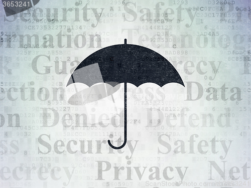 Image of Protection concept: Umbrella on Digital Paper background