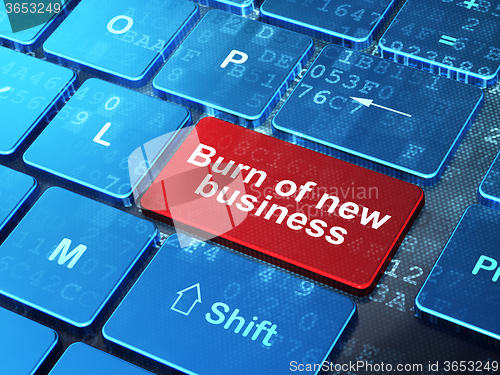 Image of Finance concept: Burn Of new Business on computer keyboard background