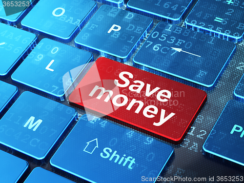 Image of Money concept: Save Money on computer keyboard background