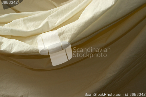 Image of draped muslin background cloth close up
