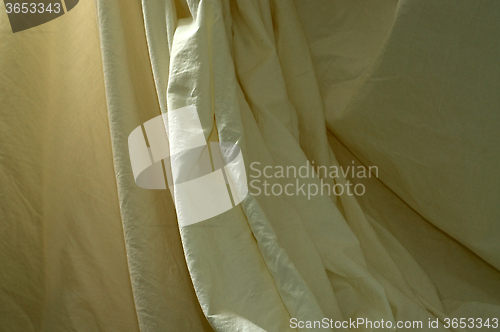 Image of draped muslin background cloth with folds