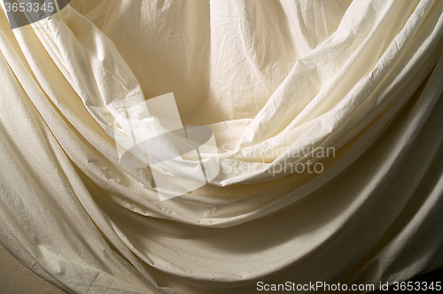 Image of draped muslin background cloth