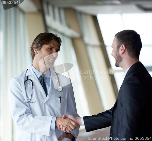 Image of doctor handshake with a patient