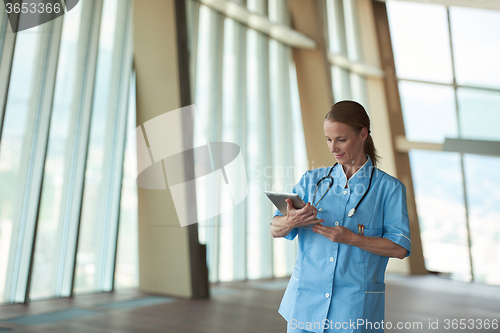 Image of female doctor with tablet computer