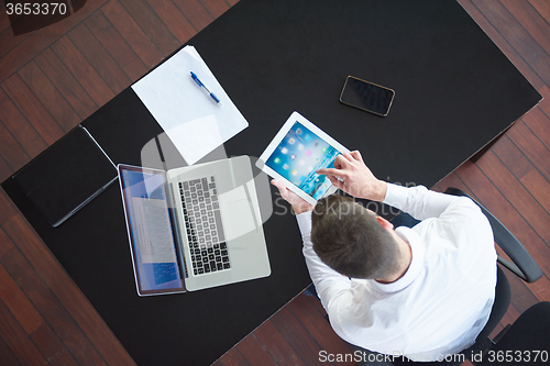 Image of top view of young business man at office