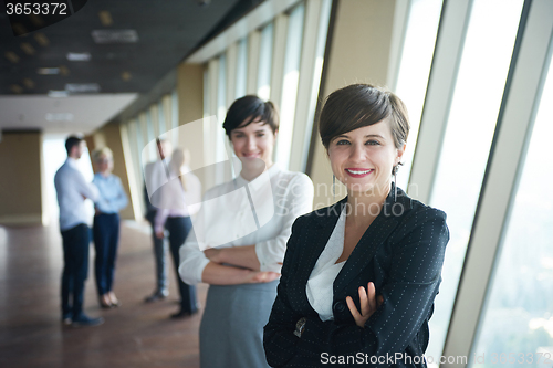 Image of business people group, females as team leaders