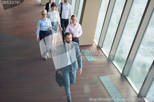 Image of business people group walking