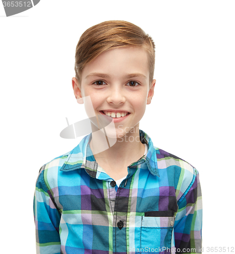 Image of smiling boy in checkered shirt