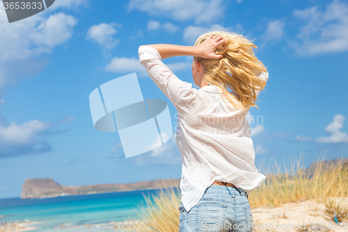 Image of Free Happy Woman Enjoying Sun on Vacations.