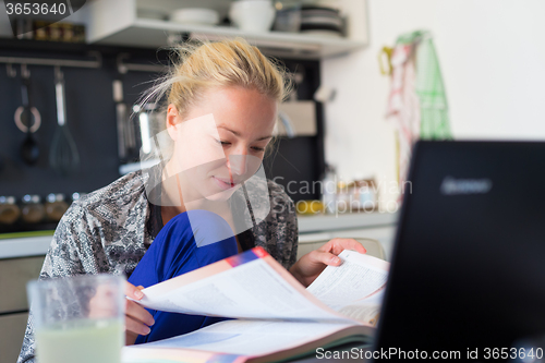 Image of Female freelancer working from home.