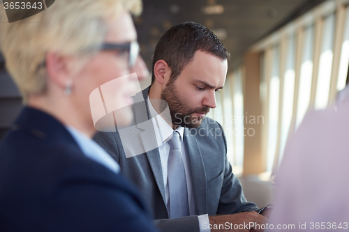 Image of business people group on meeting at office