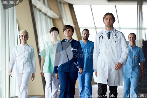 Image of doctors team walking