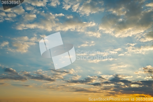 Image of Sunset clouds and light rays