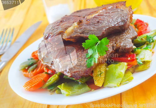 Image of baked meat with vegetables