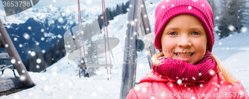 Image of happy beautiful little girl over winter background