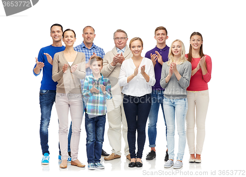 Image of group of smiling people applauding