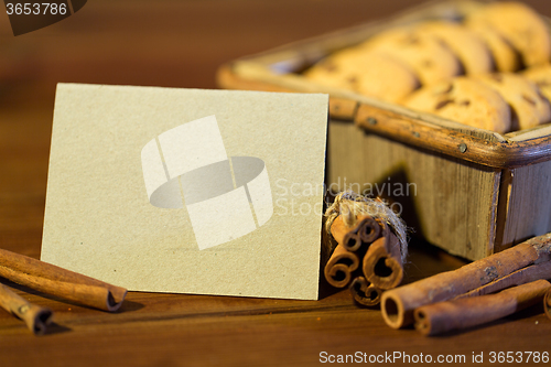 Image of close up of christmas oat cookies on wooden table