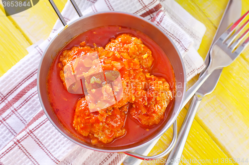 Image of meat ball with tomato sauce