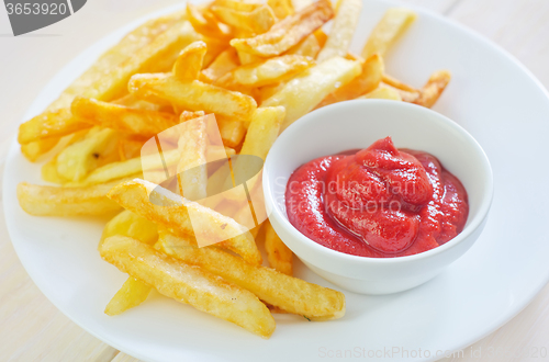 Image of potato fries with sauce