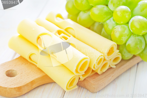 Image of cheese  and grape