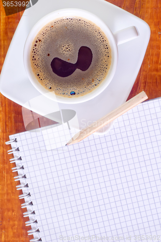 Image of note and coffee cup