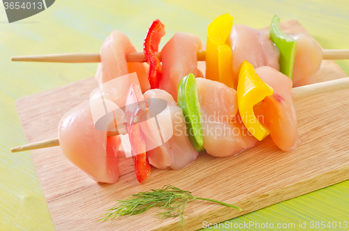 Image of chicken kebab with vegetables