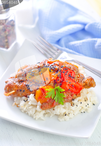 Image of boiled rice with meat and vegetables