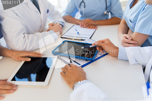 Image of group of doctors meeting at hospital office