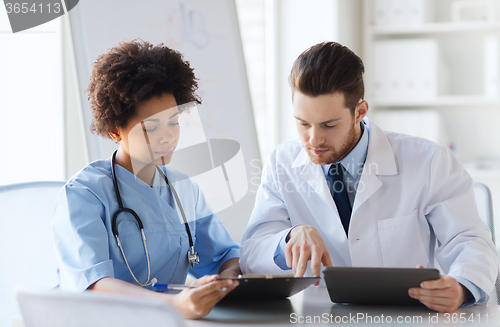 Image of two doctors meeting at hospital office