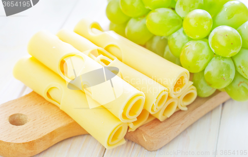 Image of cheese  and grape