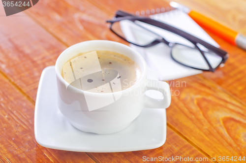 Image of coffee and note
