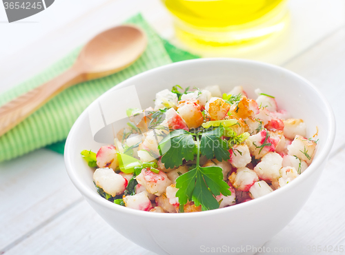 Image of Fresh salad with greens and seafood