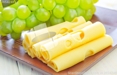Image of cheese  and grape