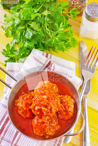 Image of meat ball with tomato sauce