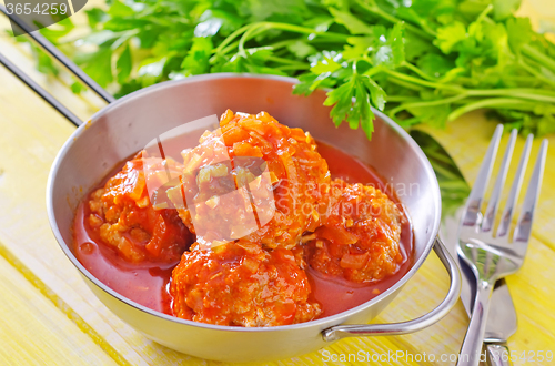 Image of meat ball with tomato sauce