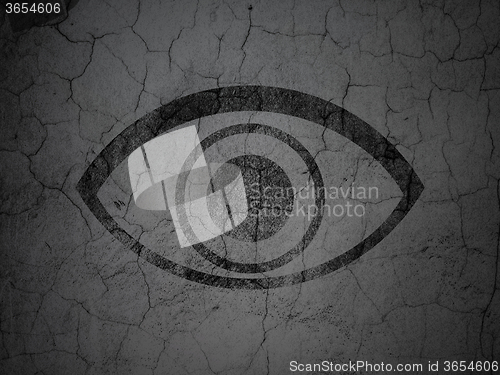 Image of Privacy concept: Eye on grunge wall background