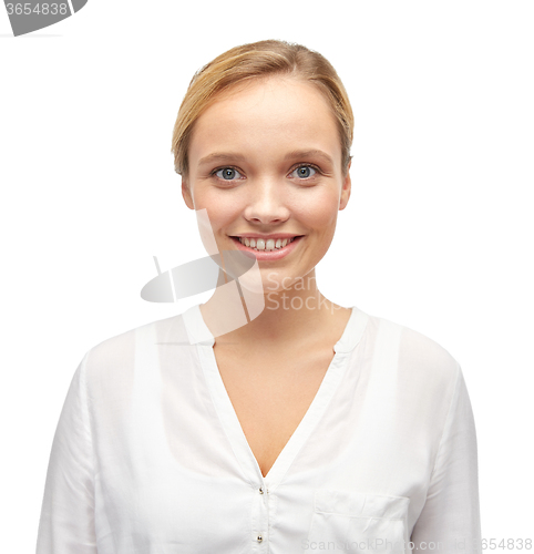 Image of smiling young woman or teenage girl in shirt